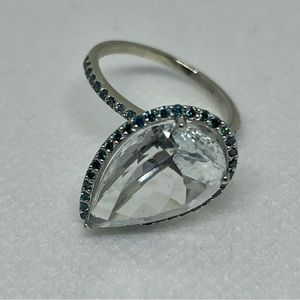 14 karat white gold , white Topaz & blue diamond cocktail Ring